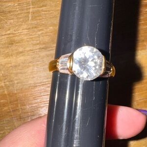 Elegant Gold tone Ring with Clear Stone